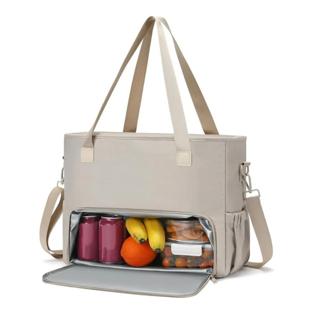 A beige insulated lunch tote bag with a laptop compartment and a separate food storage section.