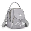 Sac bandoulière floral gris clair et durable avec fermeture éclair et sangle réglable.