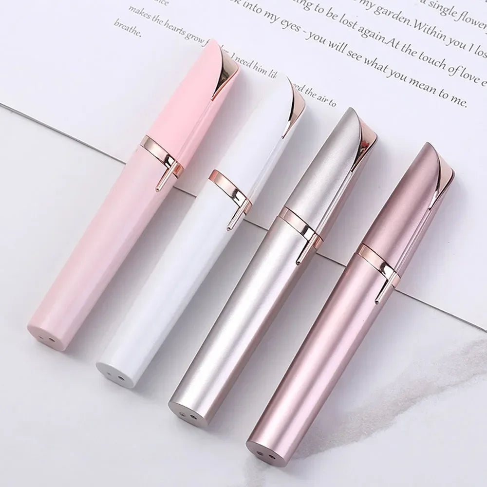 Three precision electric eyebrow trimmers in pink, white, and silver are displayed on a white background.