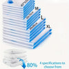 Stack of white reusable vacuum compression storage bags labeled S, M, L, and XL sizes.