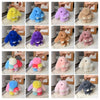 A collection of cute plush rabbit bag charms in various colors including yellow, blue, purple, pink, and beige.