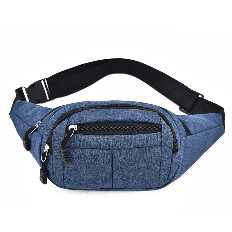 A dark blue canvas waist fanny bag with black trim and zippered compartment.