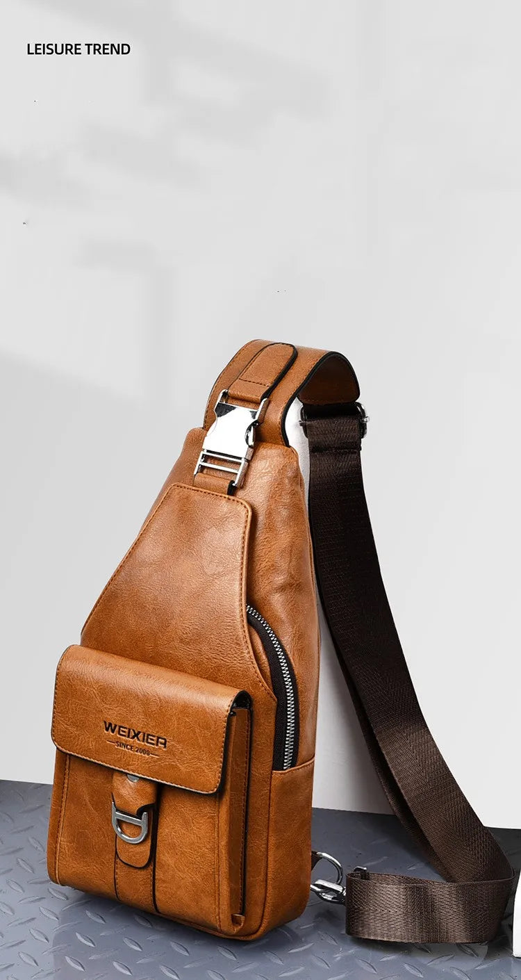 A brown men's PU leather belt sling chest bag with a dark brown strap shown in a studio setting.