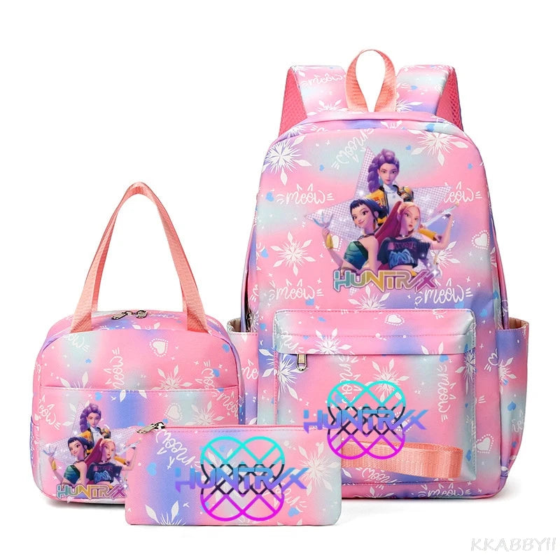 A pink and purple multi-compartment backpack set featuring a unicorn theme with various compartments.