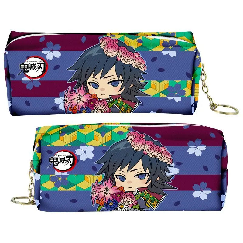 A purple and blue Demon Slayer themed PU leather pencil case with a zipper and a charm.