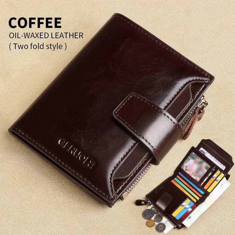 A dark brown oil-waxed leather two-fold style wallet resting on a beige surface with loose cards and coins.