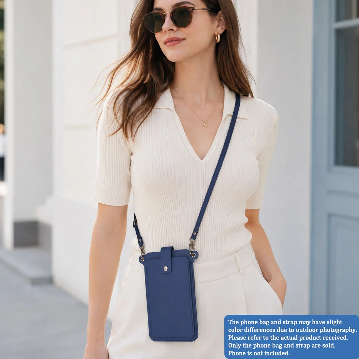 A woman models a light beige mini PU leather crossbody phone bag with a navy strap and white outfit.