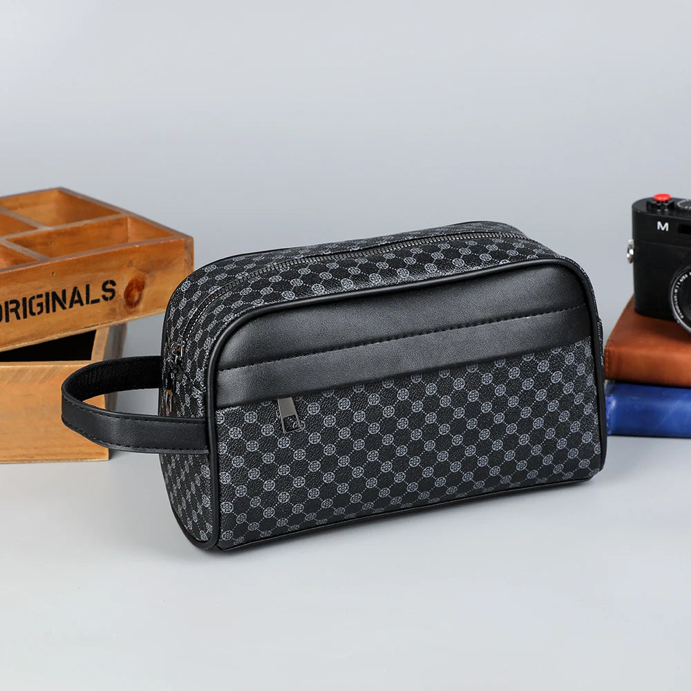 Black PU leather clutch handbag with a checkered pattern resting on a gray surface.