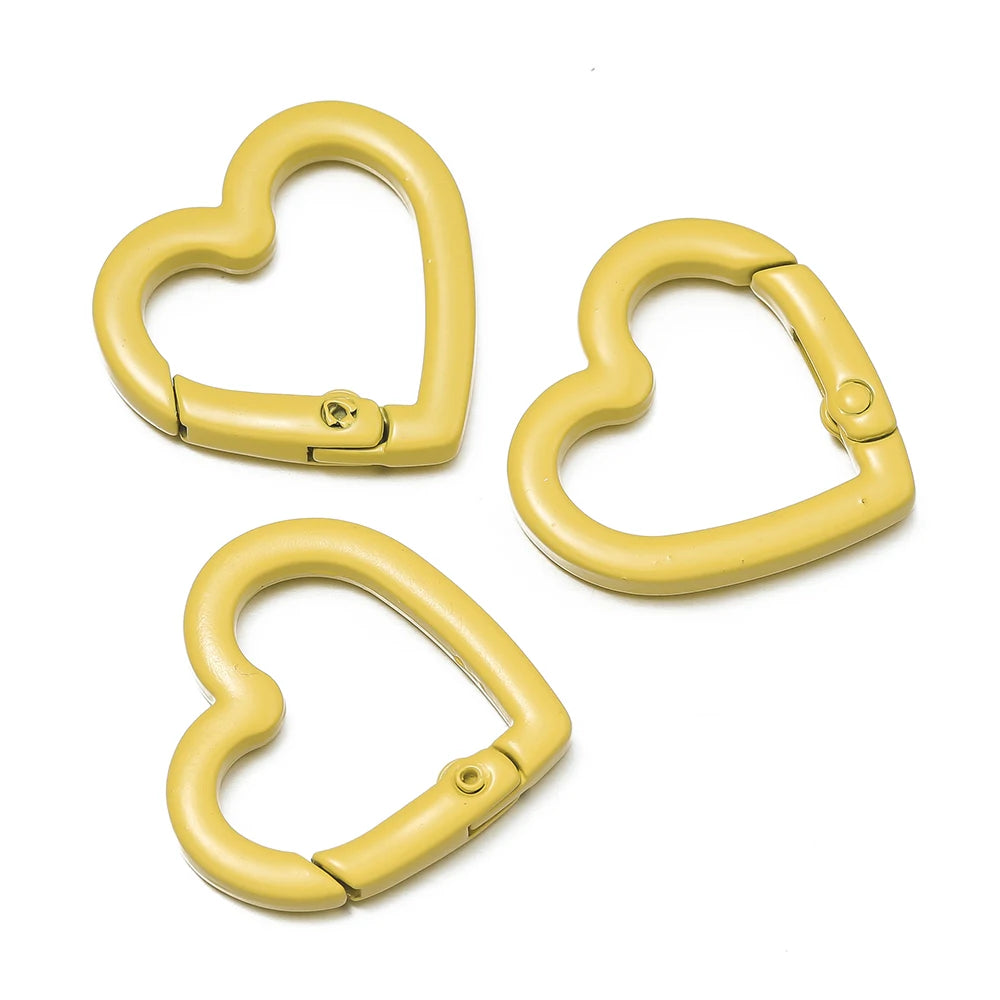 Three gold heart-shaped metal spring clasps for DIY jewelry and keychains