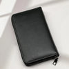 A black multi-card men's commuter wallet lying on a white surface.