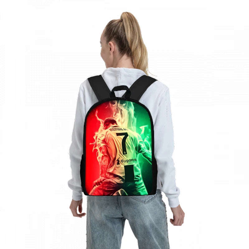 A white long-sleeved shirt with a black backpack featuring a cartoon football player design.