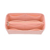 A pink felt insert liner designed for handbags, showing the interior divided compartments.