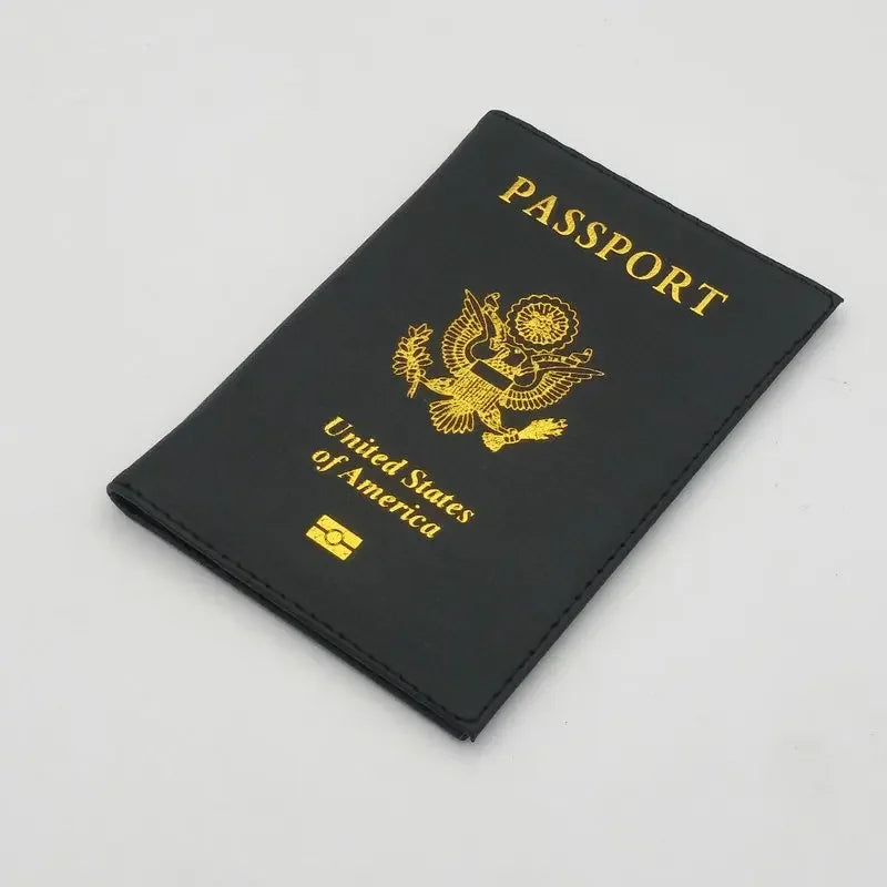 Black leather passport holder with gold embossed United States of America eagle design