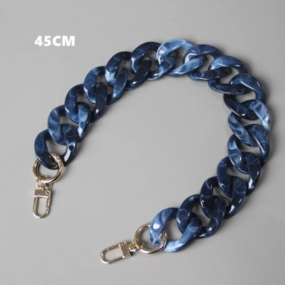 A flexible blue acrylic resin chain strap measuring 45cm with a clasp.