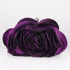 A deep purple rose floral evening clutch bag with a silver chain strap.