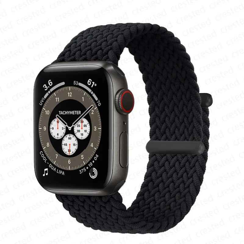 A black braided solo loop stretch band is shown next to an Apple Watch.