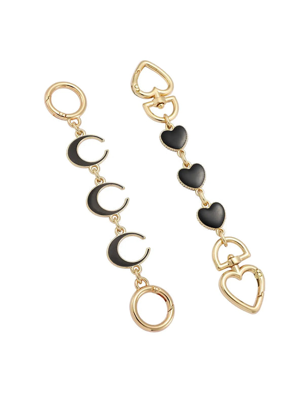Gold and black adjustable purse chain extender set featuring heart and circle charms