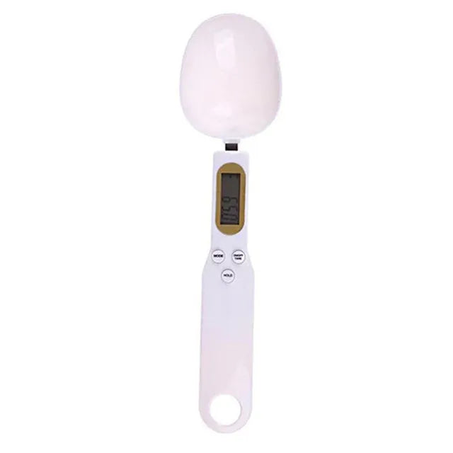 A white digital kitchen scale with a round glass weighing platform and a handle.