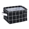 Black and white checkered storage basket with a white interior lining for desk organization