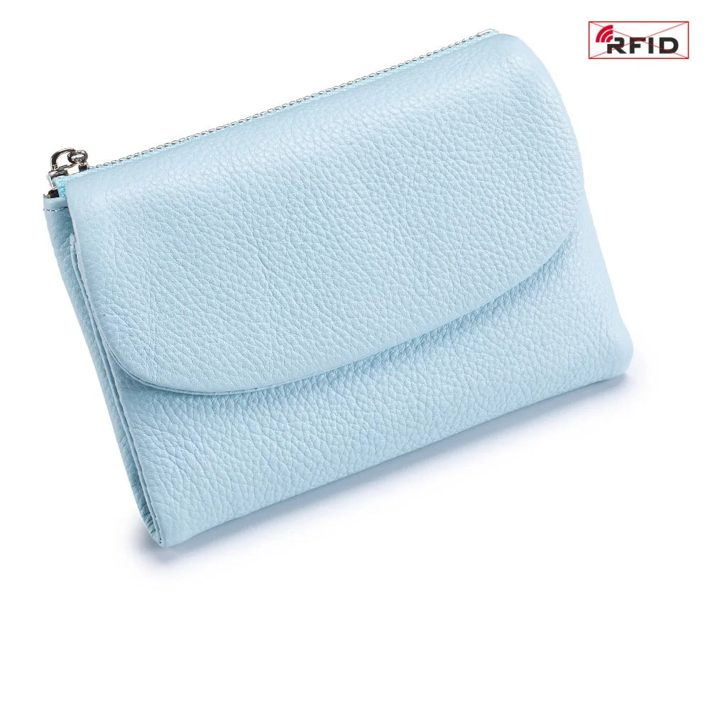 Light blue genuine leather mini card holder wallet with a zipper closure