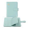 A light mint green PU leather passport holder with credit card slots and a gold-toned logo.