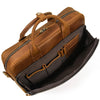 A brown vintage genuine leather briefcase with a padded interior and leather straps.