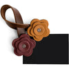 A handmade PU leather rose bag charm featuring layered, textured flowers in shades of brown and terracotta.