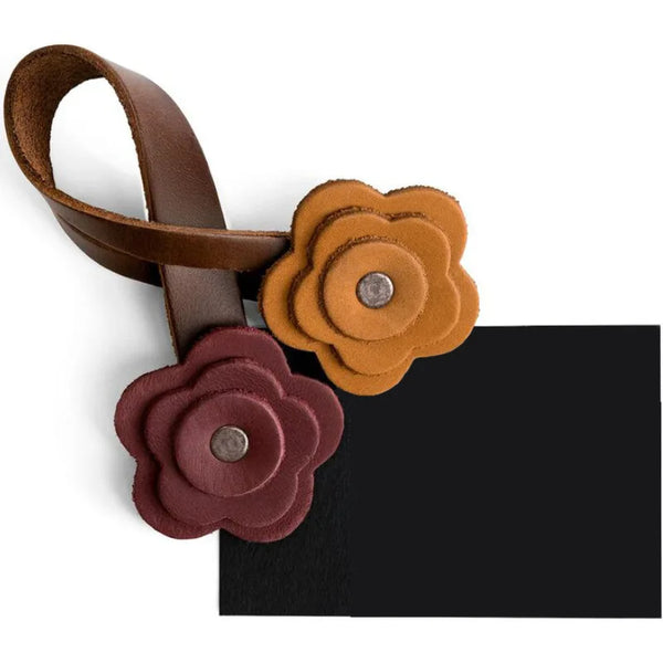 A handmade PU leather rose bag charm featuring layered, textured flowers in shades of brown and terracotta.