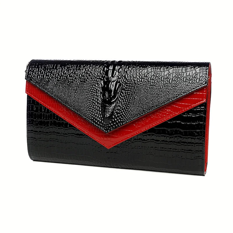 Black alligator pattern leather clutch bag with a red accent detail