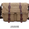 Khaki canvas messenger bag with brown leather straps and buckles