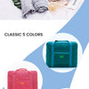 A collection of five colored foldable travel bags, including navy blue, teal, pink, dark blue, and black.