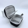 Gray and black durable EVA hard shell camera case shown open on a white surface.