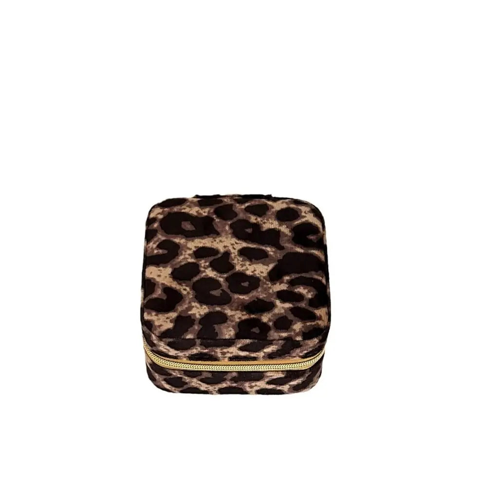 A dark brown leopard print PU leather jewelry storage box with a gold-colored zipper.