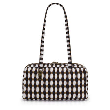 Sac fourre-tout en nylon à bretelles à imprimé léopard noir et blanc.