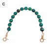 Handcrafted resin stone bead bag chain with green and blue beads.