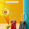 A set of red and black combination locks with metal rings displayed against a yellow background.