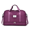 A purple ZUOMANNI durable nylon travel duffle bag with padded straps.
