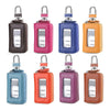 A set of leather car key cases in various colors including black, pink, blue, yellow, and orange with transparent windows.