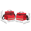 A pair of red durable waterproof emergency trauma bags with black straps and yellow accents.