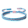 Handmade braided rope bracelet featuring pink and blue threads.