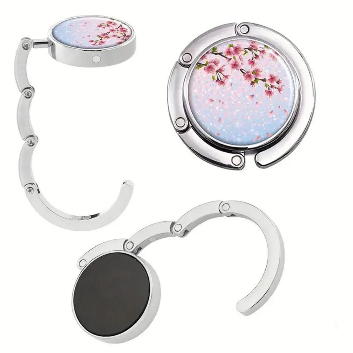 Silver bag hook with a round floral charm and a separate circular silver ring.