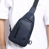 A navy blue men's adjustable crossbody sling bag worn by a person in a white shirt.
