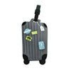 Gray rolling luggage with several colorful plastic tags attached to the exterior.