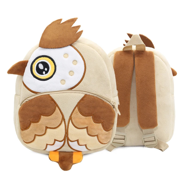 A tan cartoon animal plush backpack featuring brown fur, white accents, and large yellow eyes.