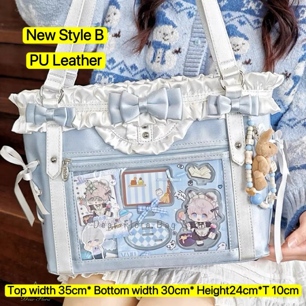 Light blue PU leather shoulder tote bag with a bow detail and decorative patches