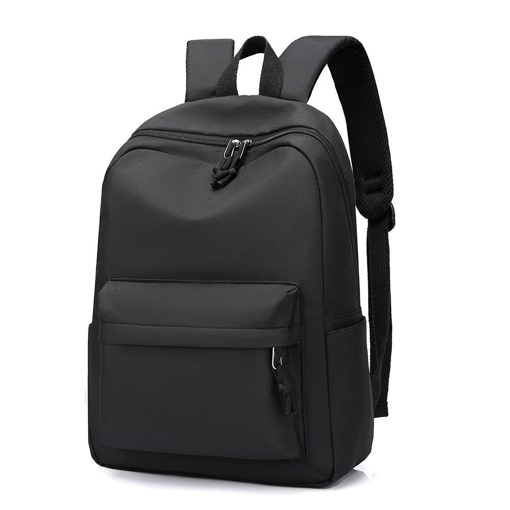 A black durable unisex leisure shoulder backpack with multiple zippered compartments.