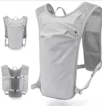 A white running and cycling hydration vest backpack shown in multiple views.