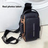 A black and tan durable men's oxford sling bag is shown with a strap, resting on a white surface.
