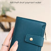 A teal RFID blocking short payment wallet is held in a hand, demonstrating its design.