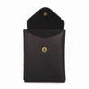 A black genuine cowhide leather wallet for men with a stitched flap and brass-colored button.